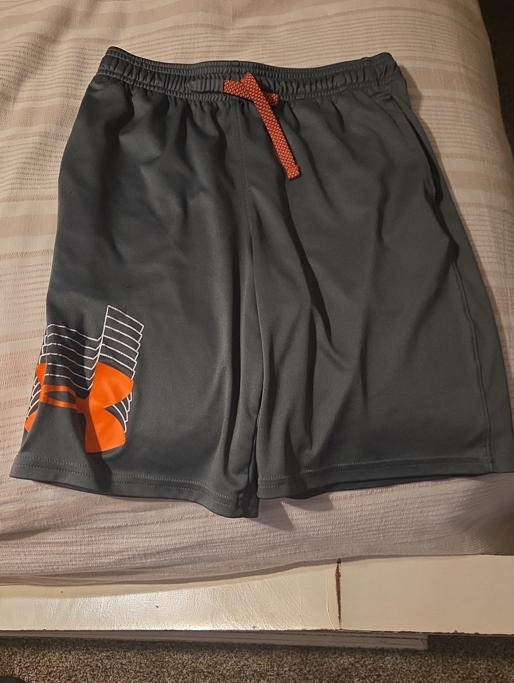 Under Armour Boy’s Gray Athletic Shorts with Orange Drawcord and Logo